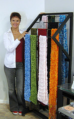 A retail rack designed and built 
to display hand knitted scarves